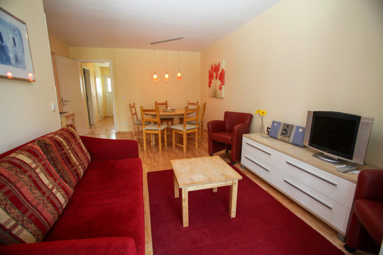 Ferienwohnung Kaiser zum Strande Wohnzimmer Essecke