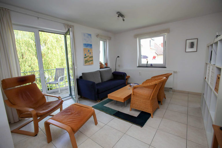 Ferienwohnung Kaiser am Lindenpark Wohnzimmer mit Balkon
